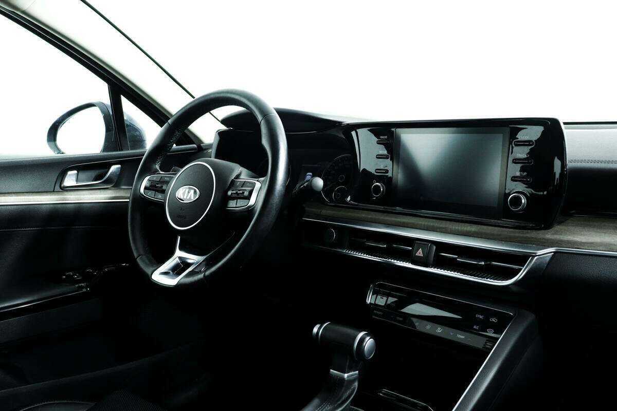 Купить Kia K5 с пробегом. Фото: #7