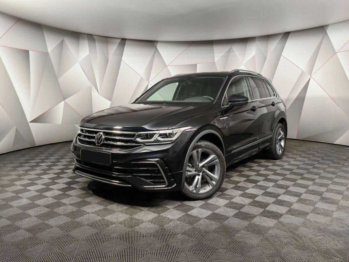 Купить Volkswagen Tiguan с пробегом. Посмотреть фото