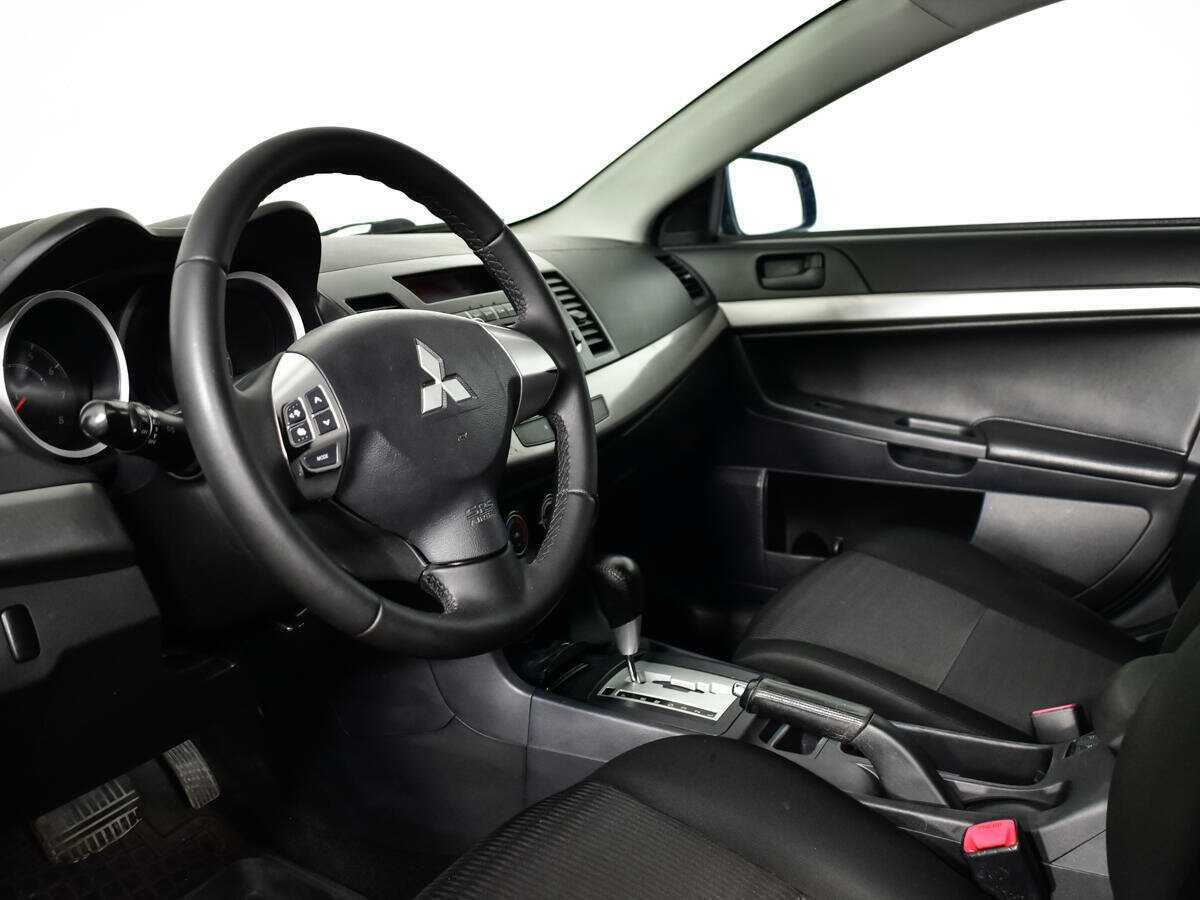 Купить Mitsubishi Lancer с пробегом. Фото: #12