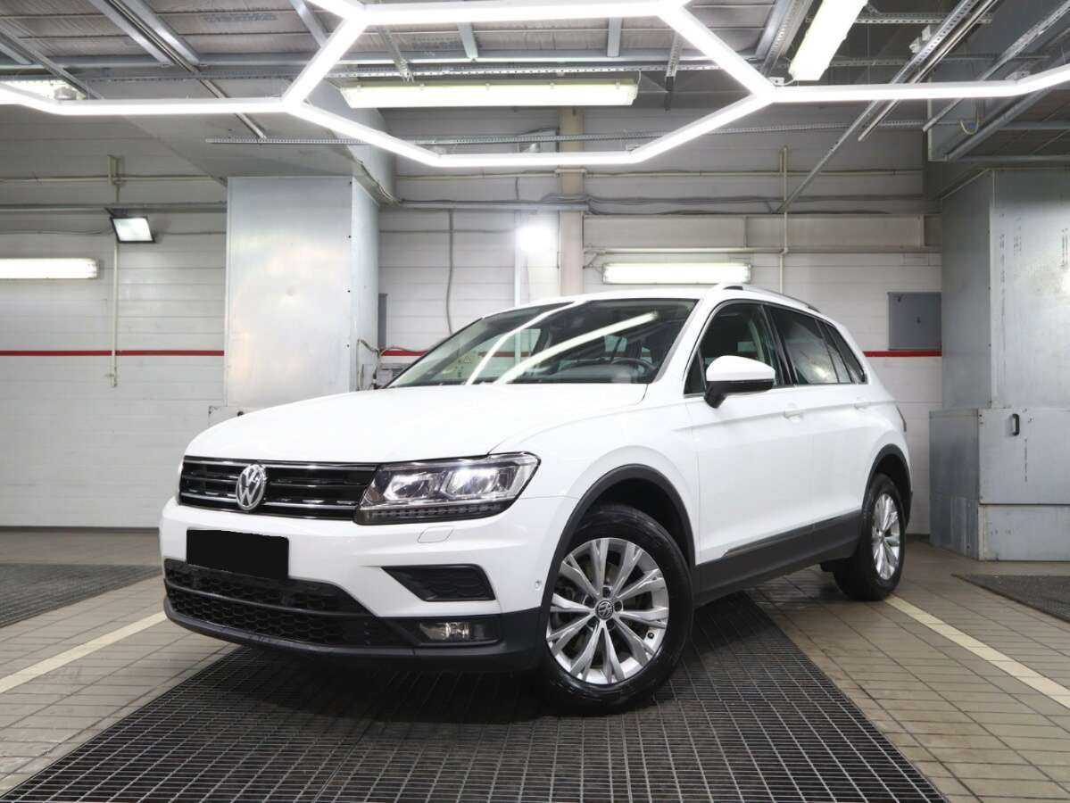 Купить Volkswagen Tiguan с пробегом. Посмотреть фото