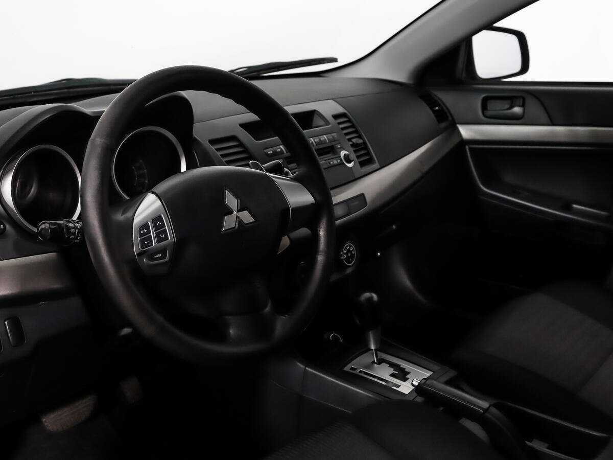 Купить Mitsubishi Lancer с пробегом. Фото: #6