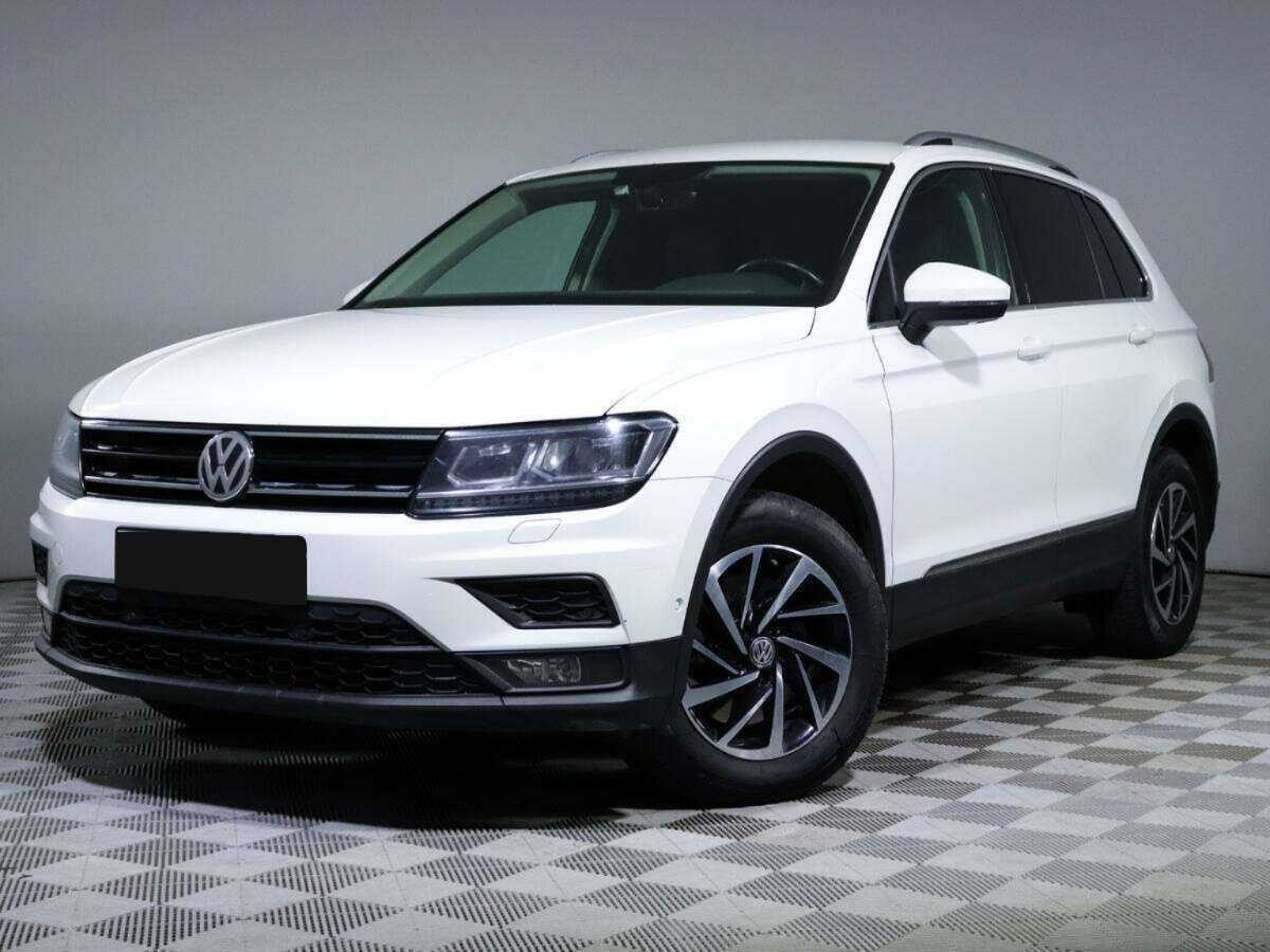 Купить Volkswagen Tiguan с пробегом. Посмотреть фото