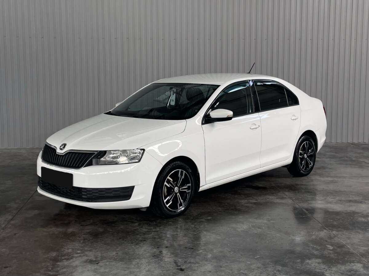 Купить Skoda Rapid с пробегом. Посмотреть фото