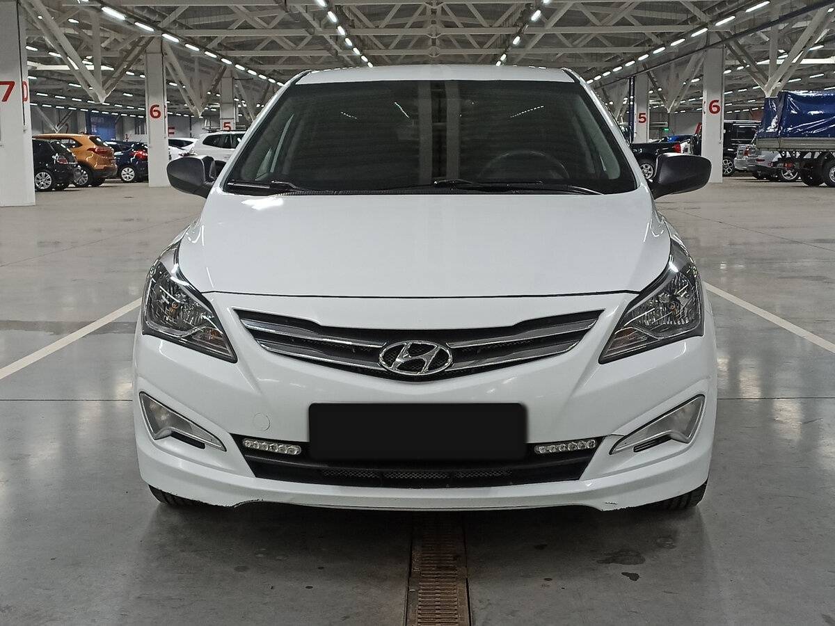 Купить Hyundai Solaris с пробегом. Фото: #1