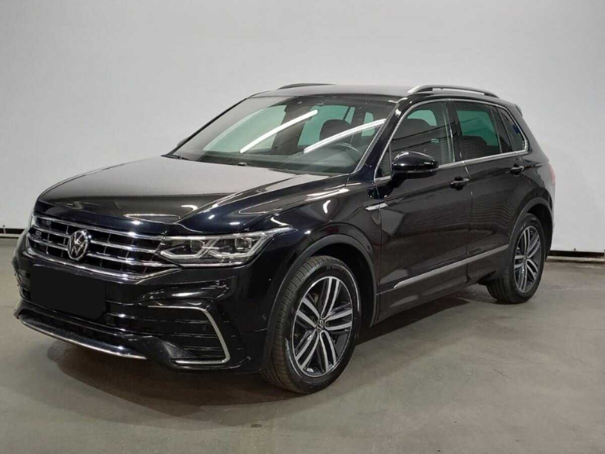 Купить Volkswagen Tiguan с пробегом. Посмотреть фото