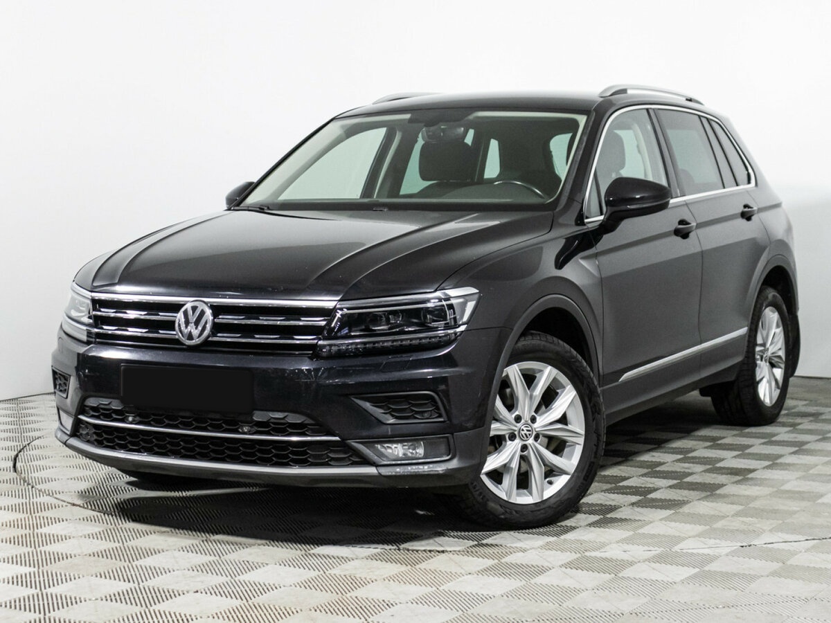 Купить Volkswagen Tiguan с пробегом. Посмотреть фото
