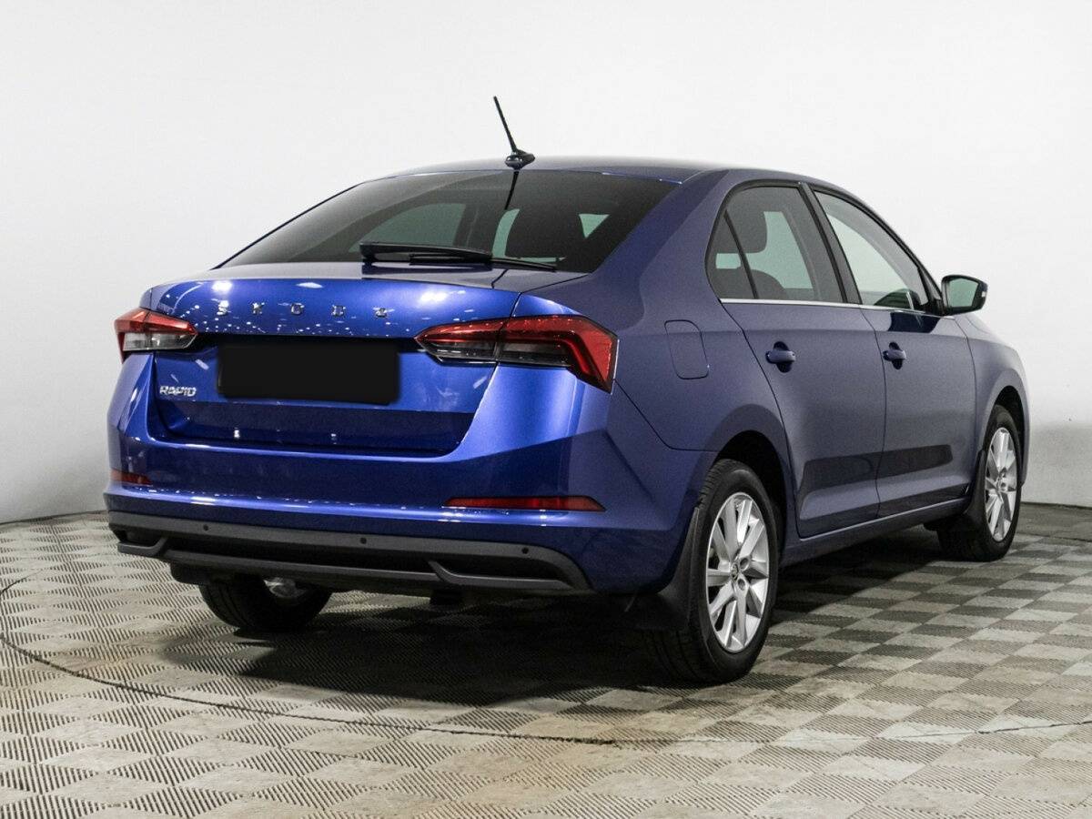 Купить Skoda Rapid с пробегом. Фото: #4