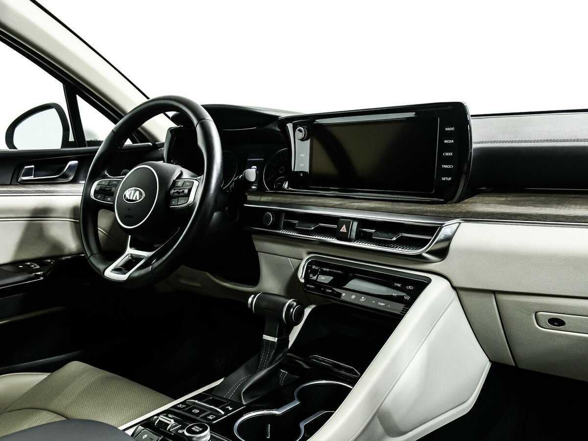 Купить Kia K5 с пробегом. Фото: #8