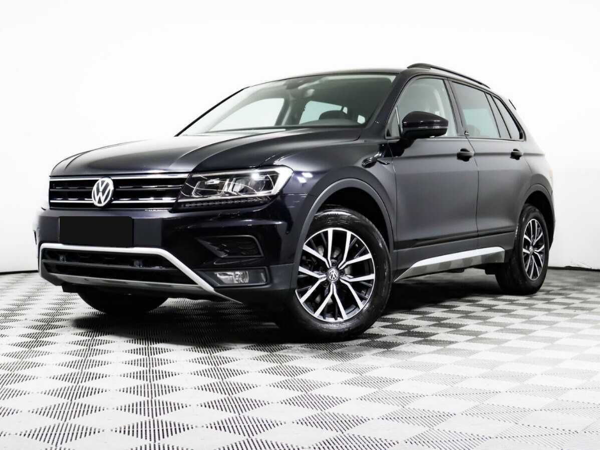 Купить Volkswagen Tiguan с пробегом. Посмотреть фото