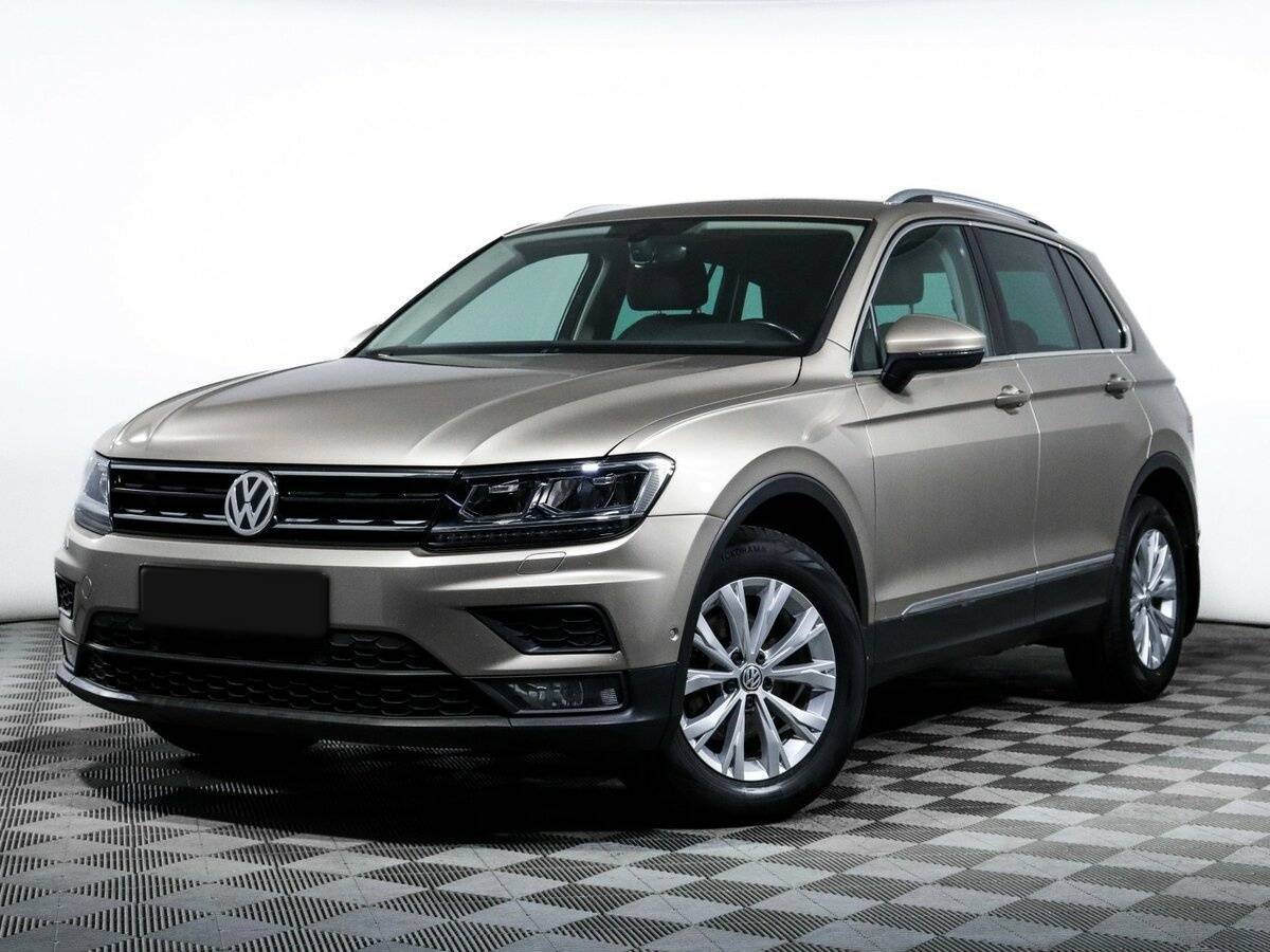 Купить Volkswagen Tiguan с пробегом. Посмотреть фото