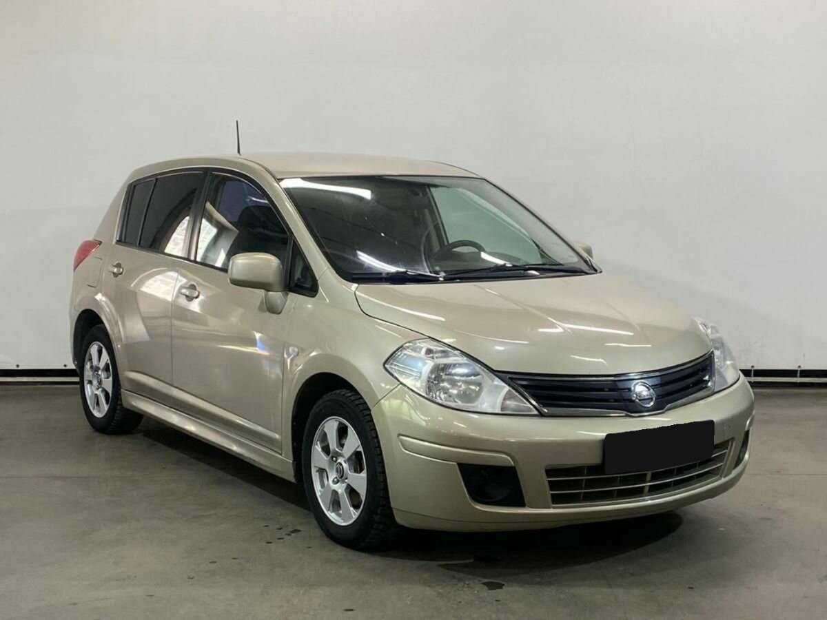 Купить Nissan Tiida с пробегом. Фото: #2