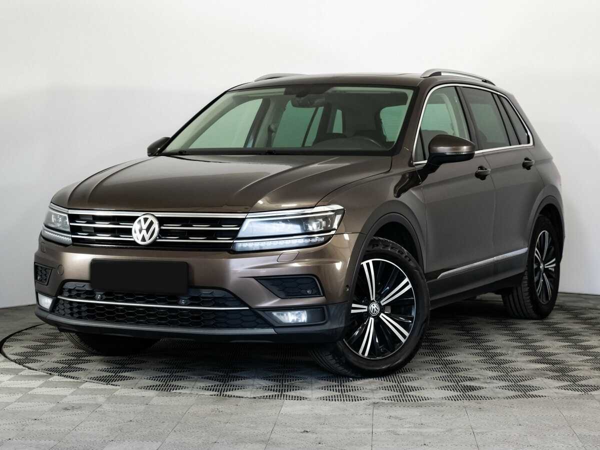Купить Volkswagen Tiguan с пробегом. Посмотреть фото