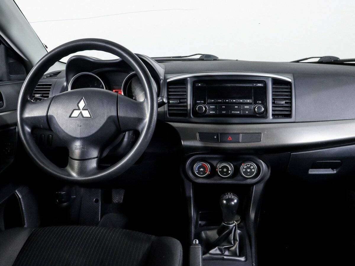 Купить Mitsubishi Lancer с пробегом. Фото: #10