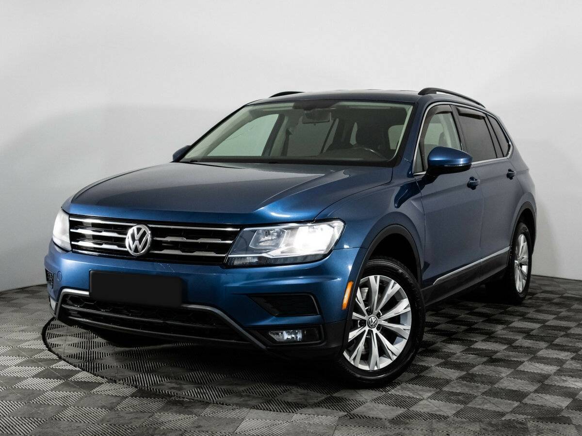 Купить Volkswagen Tiguan с пробегом. Посмотреть фото