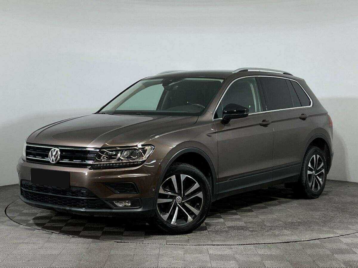 Купить Volkswagen Tiguan с пробегом. Посмотреть фото