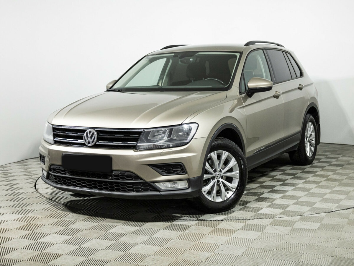 Купить Volkswagen Tiguan с пробегом. Посмотреть фото
