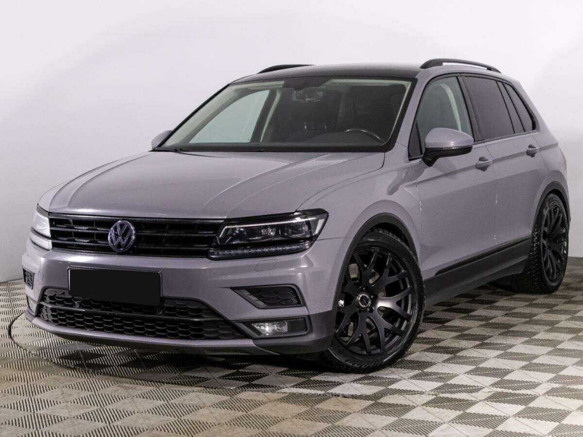 Купить Volkswagen Tiguan с пробегом. Посмотреть фото