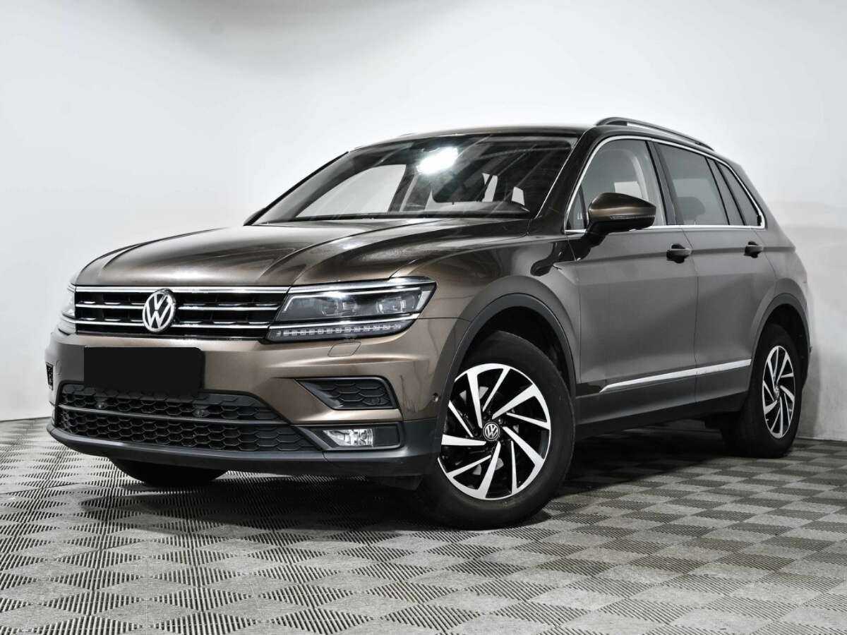Купить Volkswagen Tiguan с пробегом. Посмотреть фото