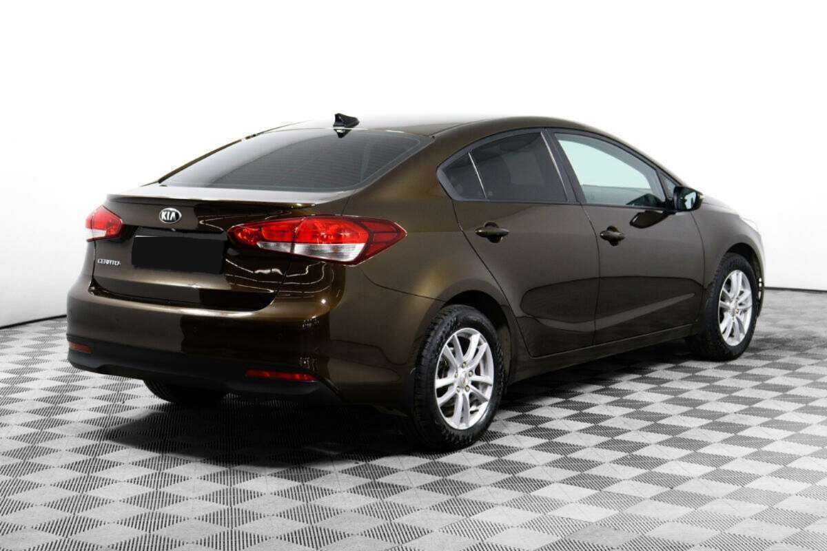 Купить Kia Cerato с пробегом. Фото: #4