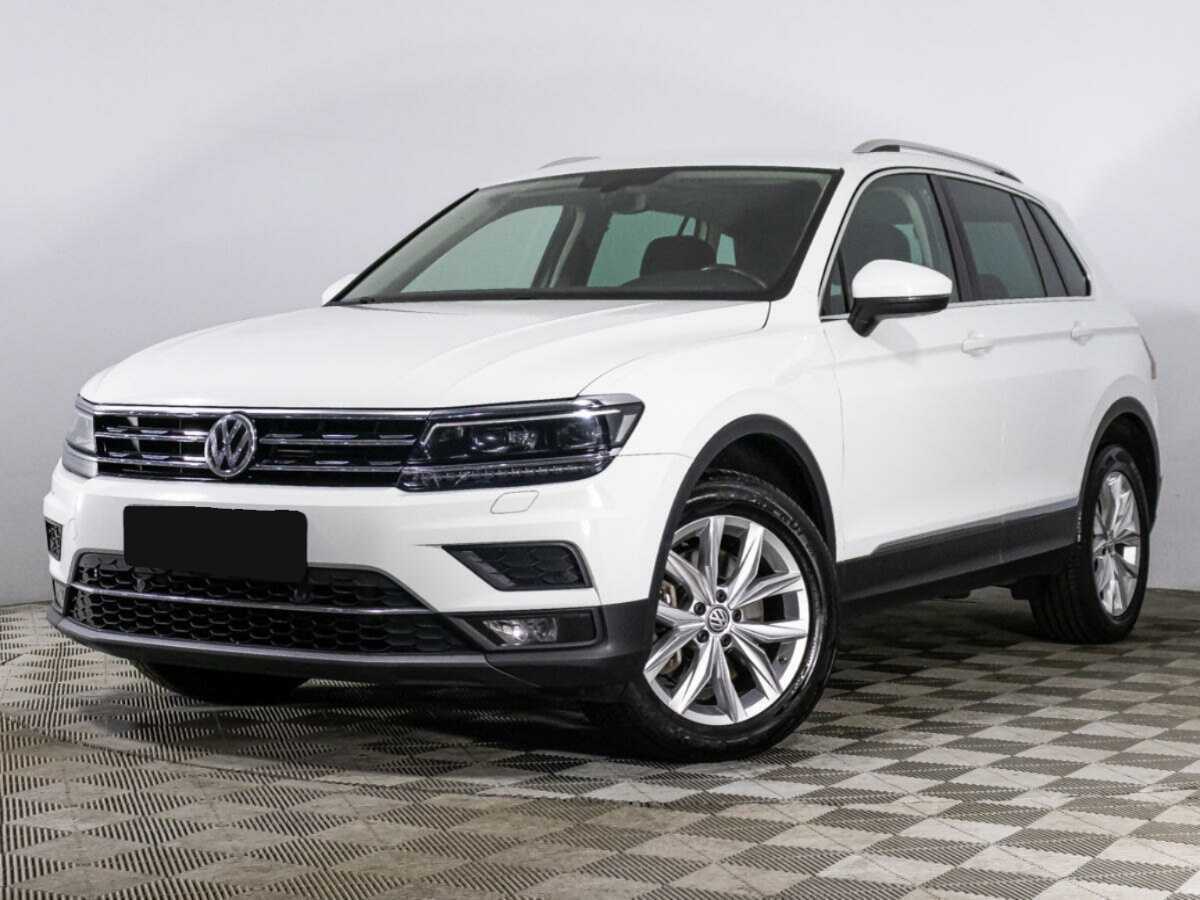 Купить Volkswagen Tiguan с пробегом. Посмотреть фото