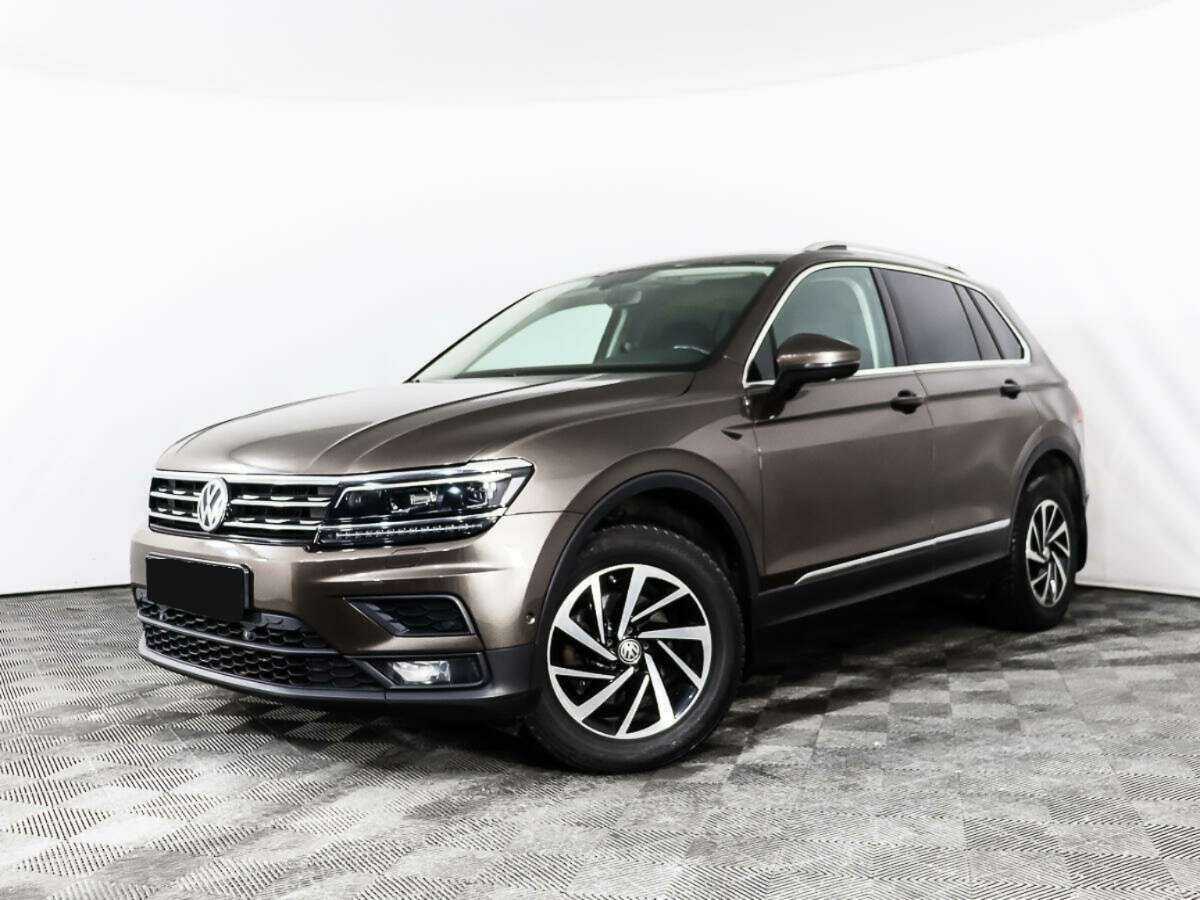 Купить Volkswagen Tiguan с пробегом. Посмотреть фото