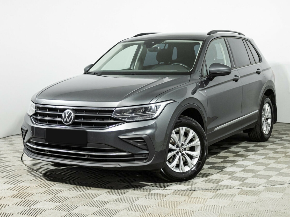 Купить Volkswagen Tiguan с пробегом. Посмотреть фото