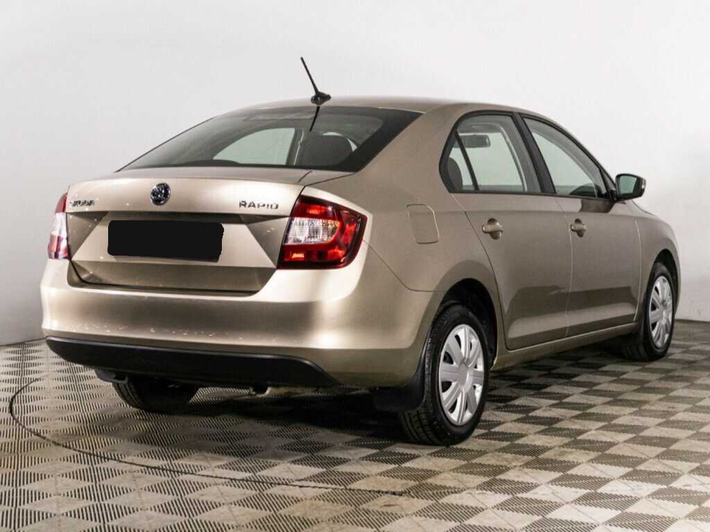 Купить Skoda Rapid с пробегом. Фото: #4