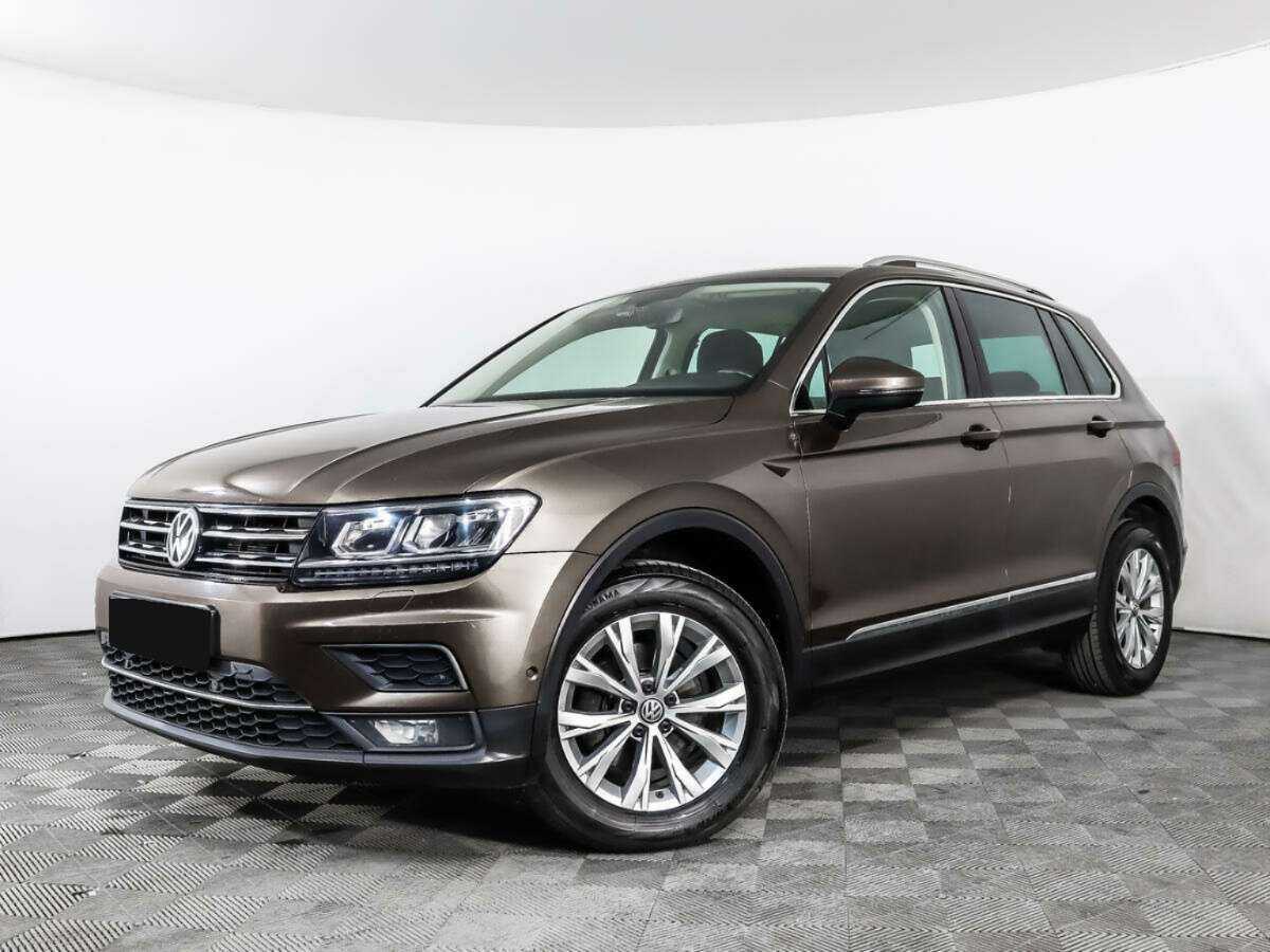 Купить Volkswagen Tiguan с пробегом. Посмотреть фото
