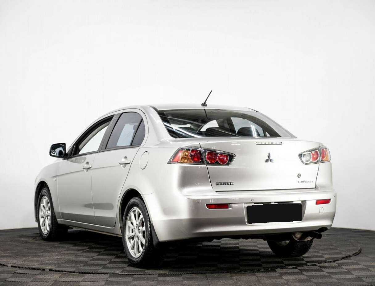 Купить Mitsubishi Lancer с пробегом. Фото: #2