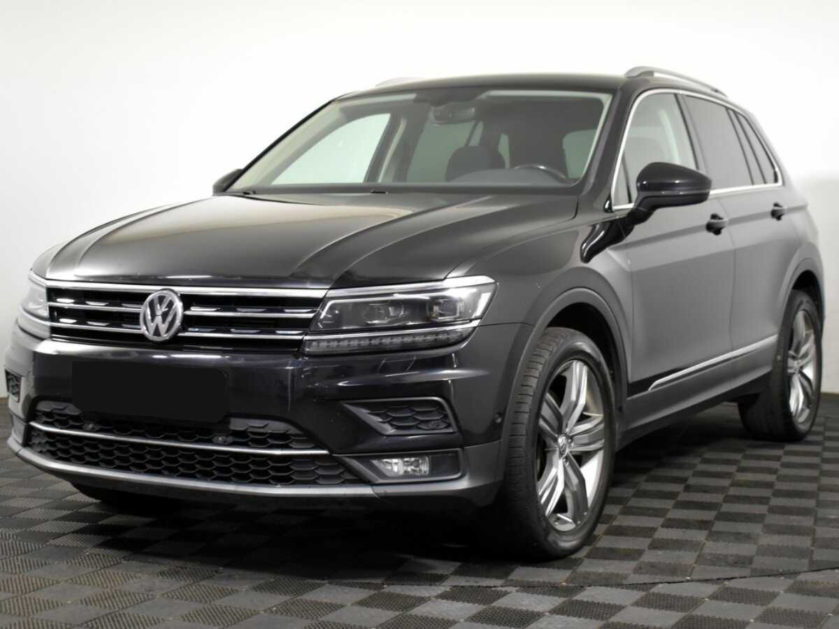 Купить Volkswagen Tiguan с пробегом. Посмотреть фото