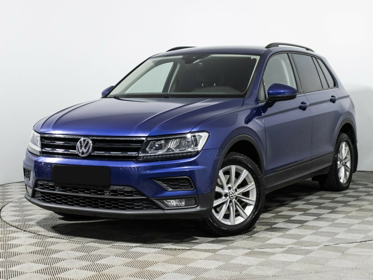 Купить Volkswagen Tiguan с пробегом. Посмотреть фото