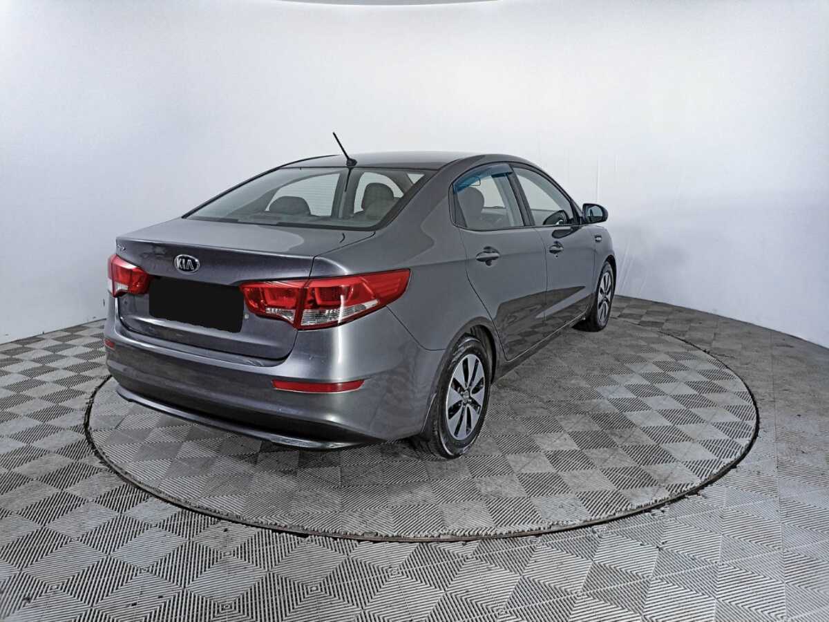 Купить Kia Rio с пробегом. Фото: #4