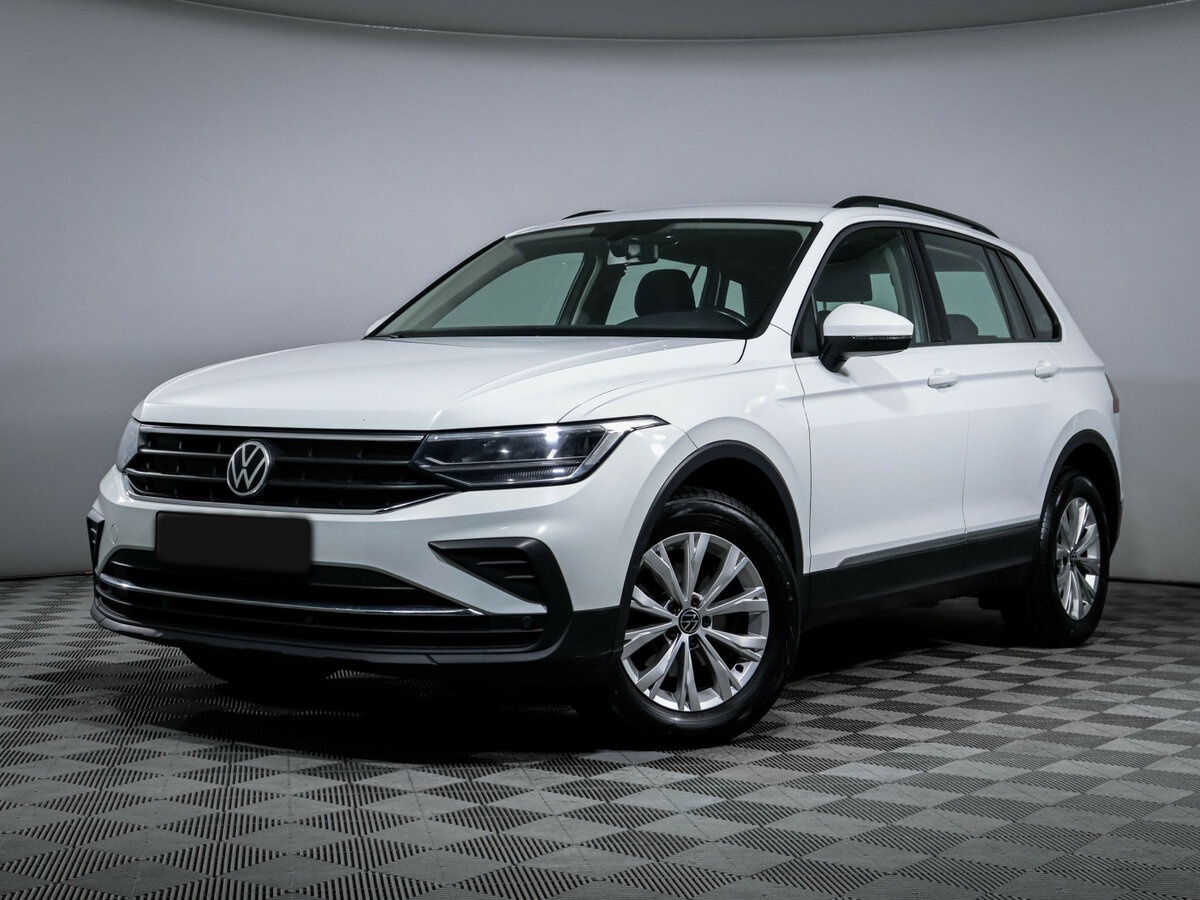 Купить Volkswagen Tiguan с пробегом. Посмотреть фото