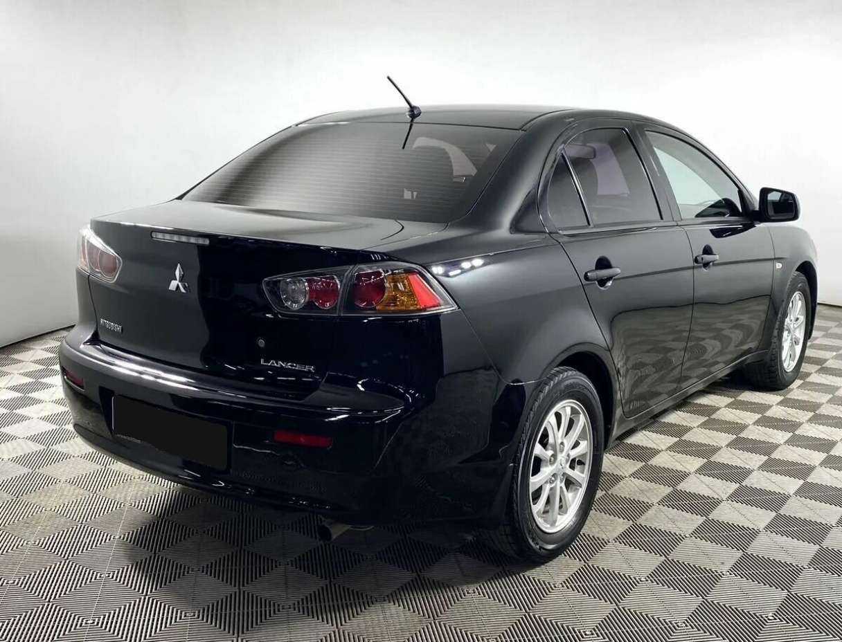 Купить Mitsubishi Lancer с пробегом. Фото: #2