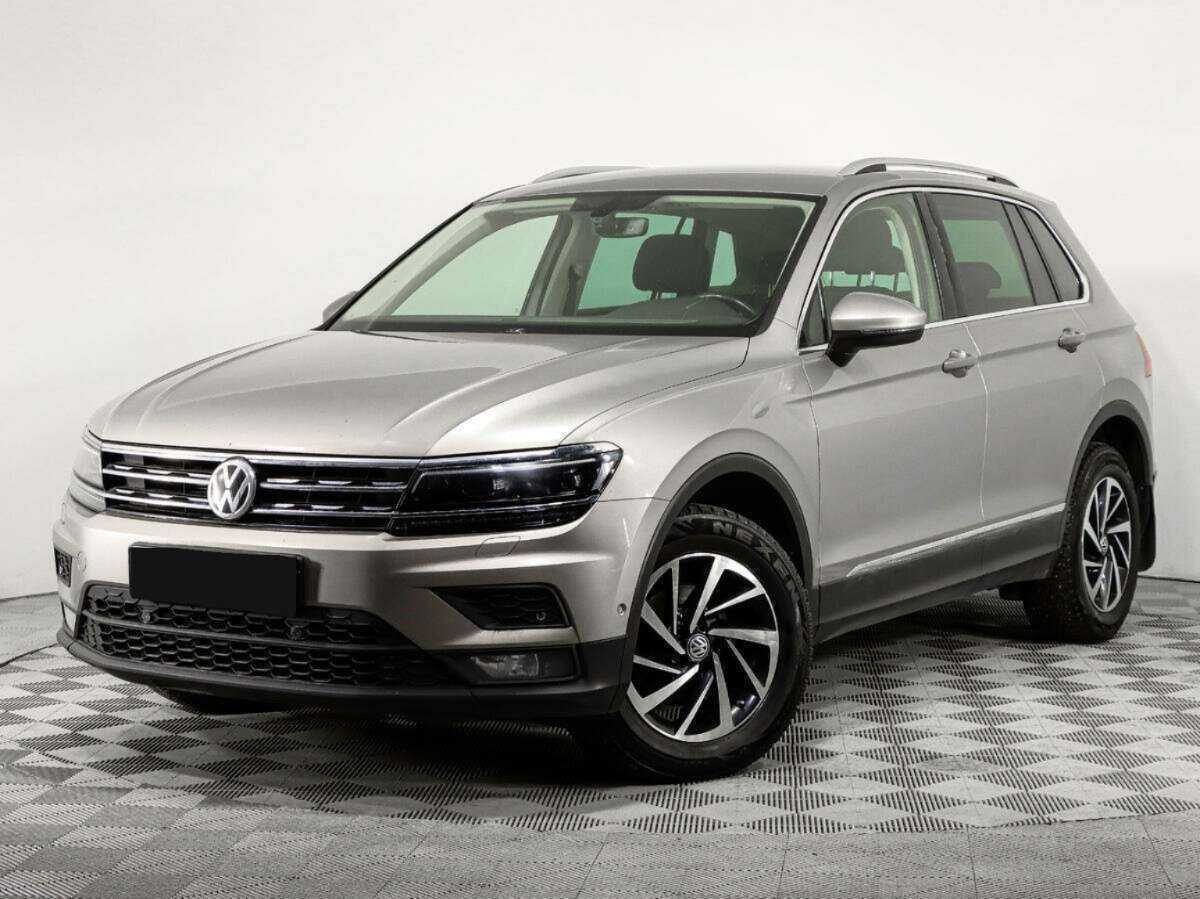 Купить Volkswagen Tiguan с пробегом. Посмотреть фото