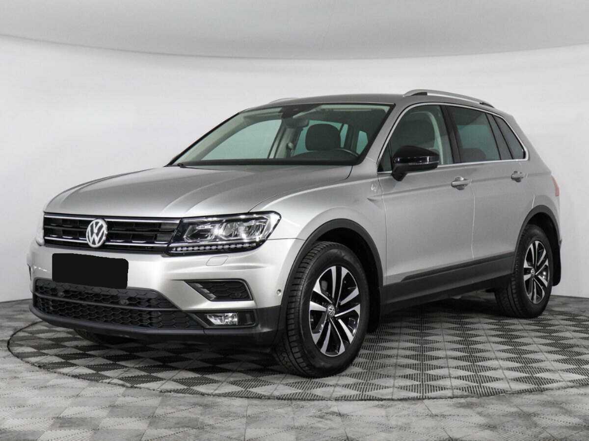 Купить Volkswagen Tiguan с пробегом. Посмотреть фото