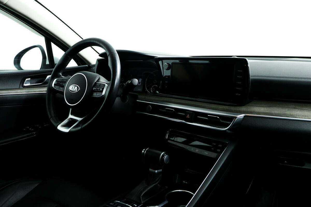Купить Kia K5 с пробегом. Фото: #8