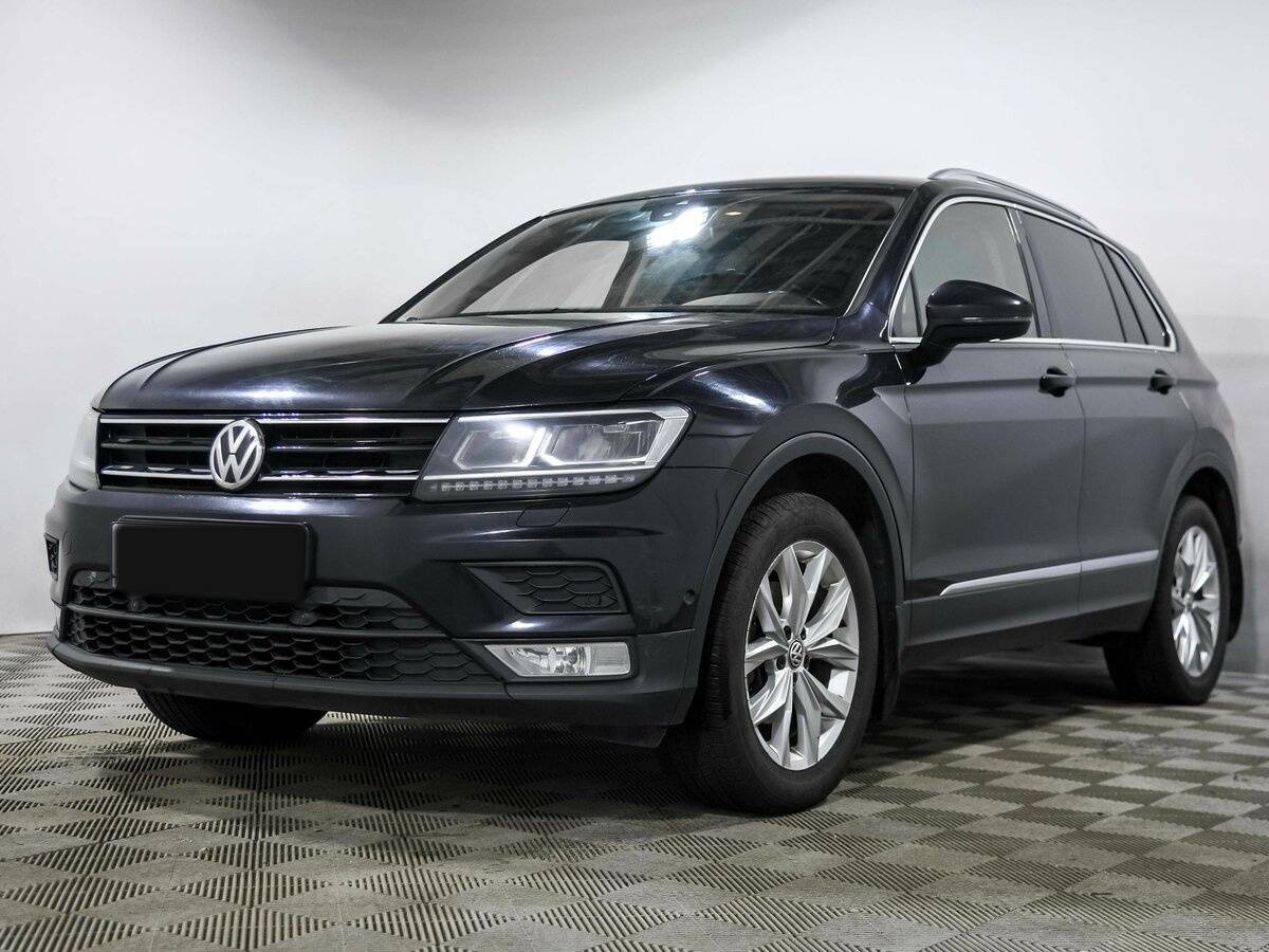 Купить Volkswagen Tiguan с пробегом. Посмотреть фото