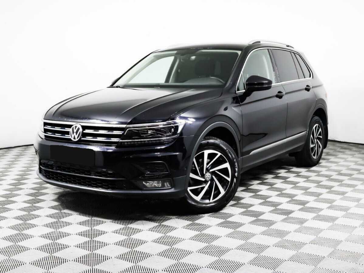 Купить Volkswagen Tiguan с пробегом. Посмотреть фото