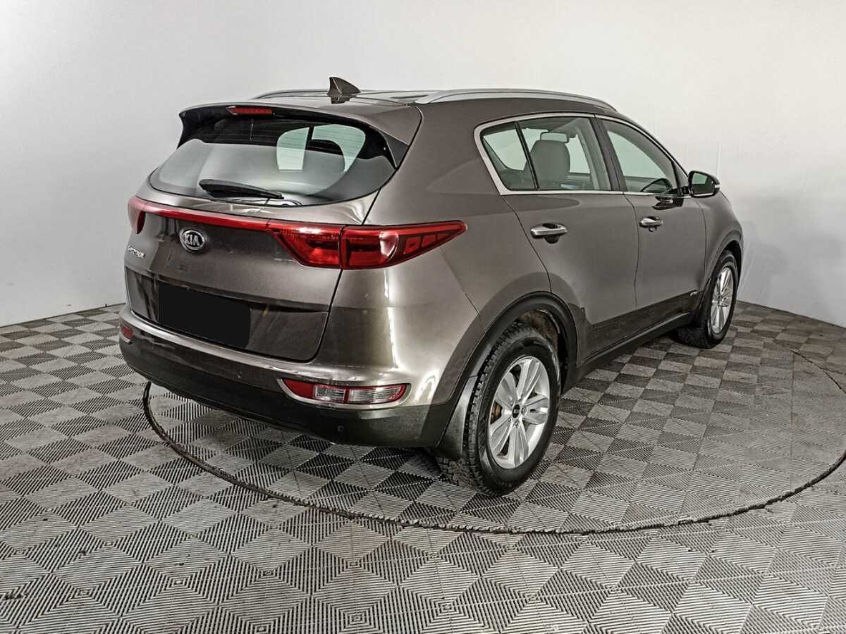 Купить Kia Sportage с пробегом. Фото: #4