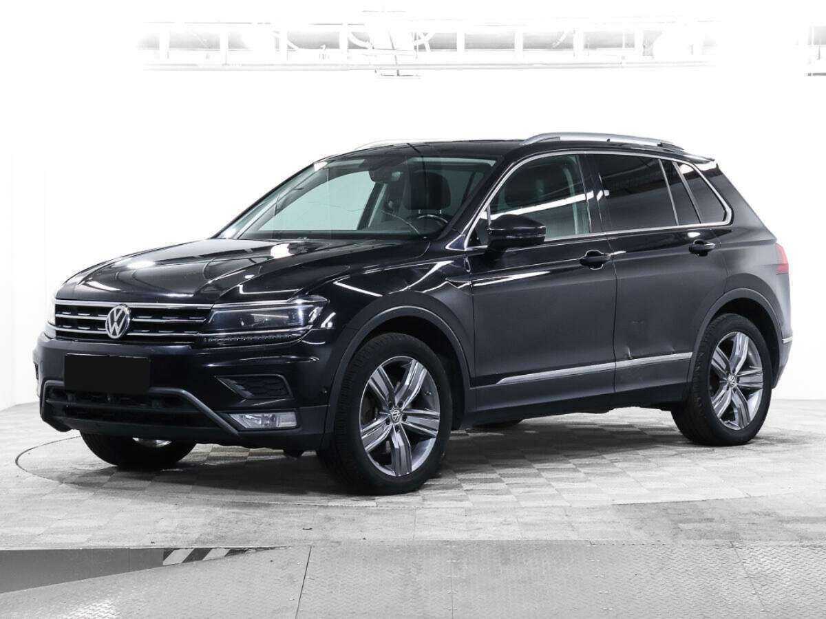 Купить Volkswagen Tiguan с пробегом. Посмотреть фото