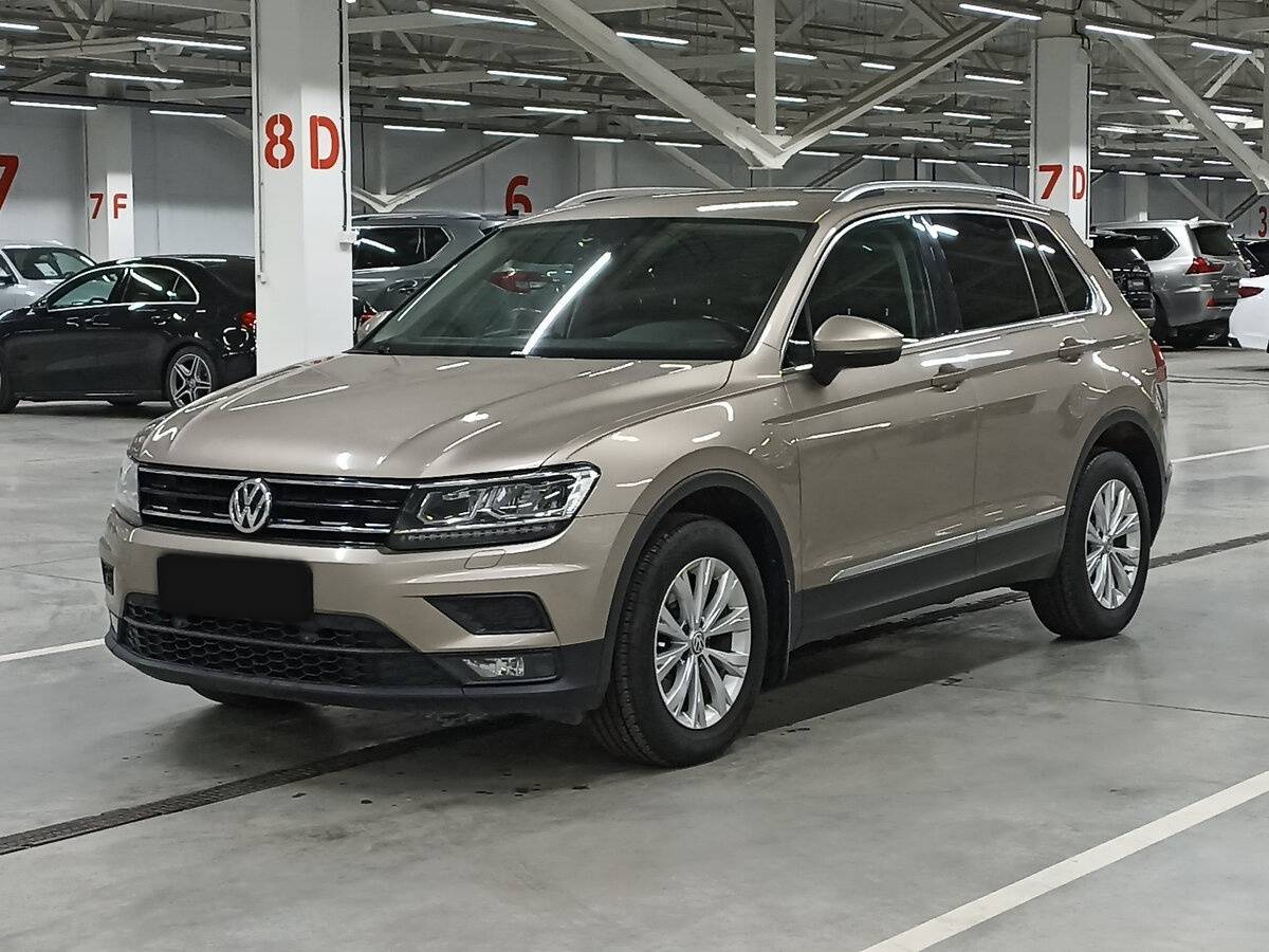 Купить Volkswagen Tiguan с пробегом. Посмотреть фото