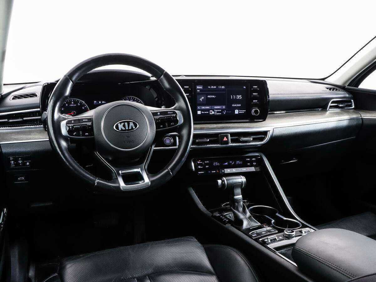 Купить Kia K5 с пробегом. Фото: #9