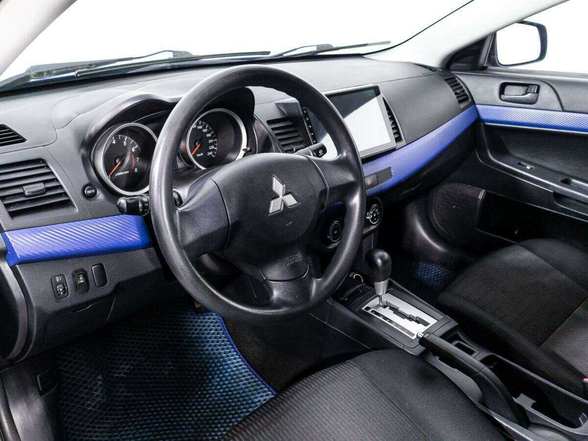Купить Mitsubishi Lancer с пробегом. Фото: #10