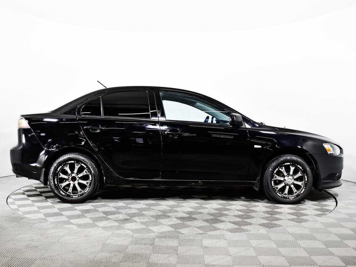Купить Mitsubishi Lancer с пробегом. Фото: #3