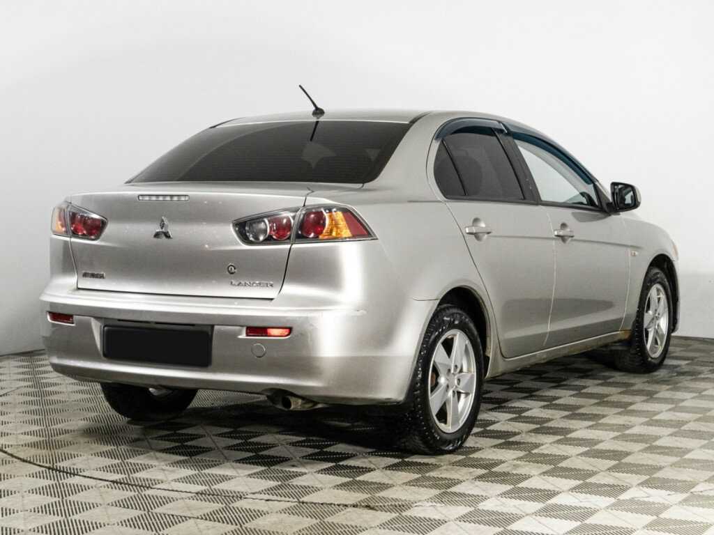 Купить Mitsubishi Lancer с пробегом. Фото: #4