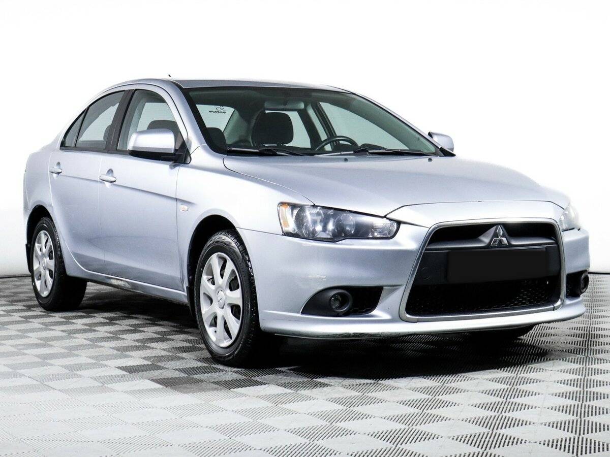 Купить Mitsubishi Lancer с пробегом. Фото: #2