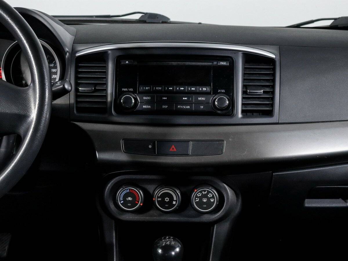 Купить Mitsubishi Lancer с пробегом. Фото: #11