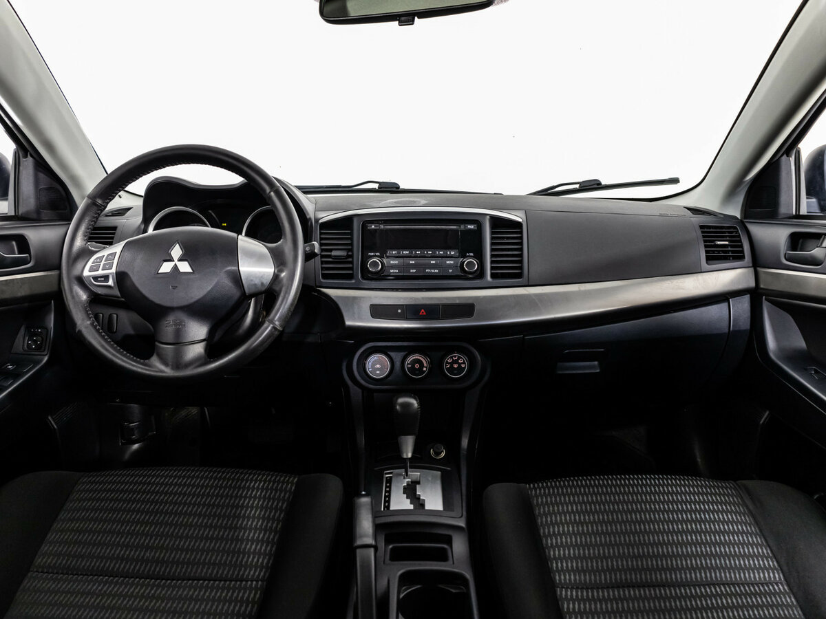 Купить Mitsubishi Lancer с пробегом. Фото: #7